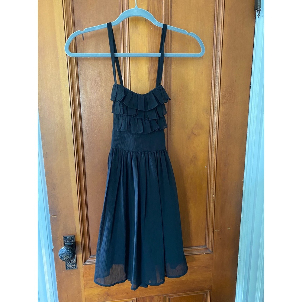 Cute little black dress with ruffles